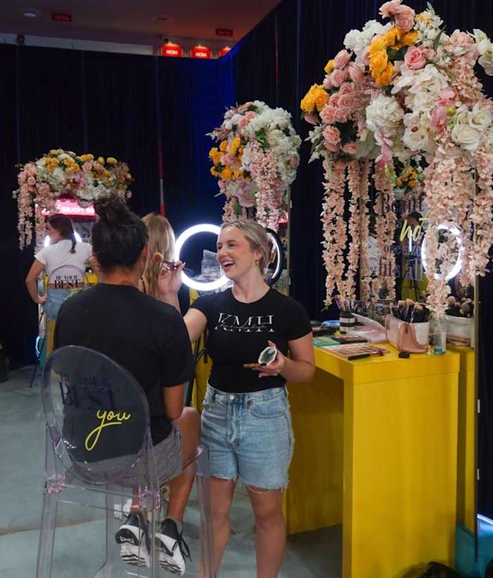 A University of Houston student gets glam at the Be You Women’s Empowerment series. 